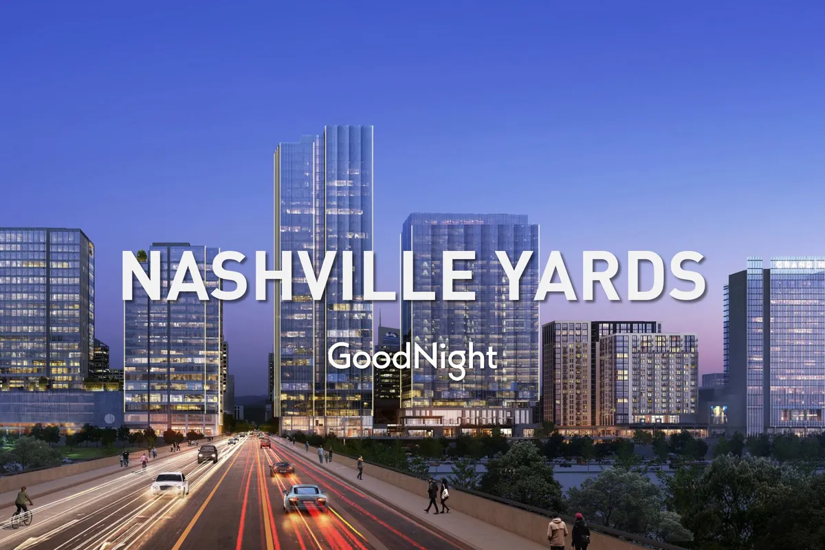 A dynamic nighttime cityscape of modern skyscrapers, illuminated by bright lights, with visible road traffic suggesting a bustling urban nightlife and endless opportunities for evening exploration.